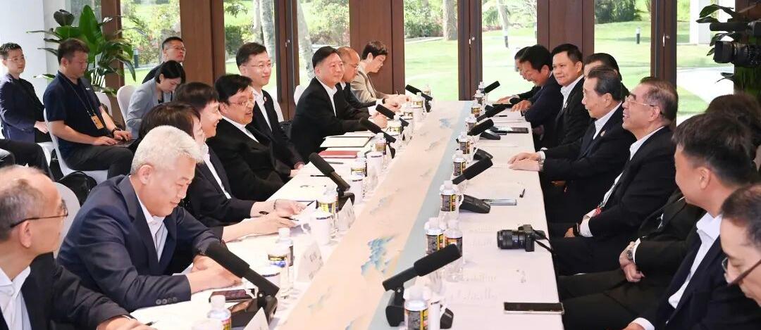 冯飞刘小明会见泰国正大集团客人